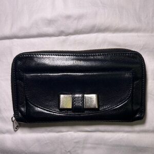 Chloe Lilly Black Calf Leather Long Zippered Wallet Silver Metal Ribbon Detail